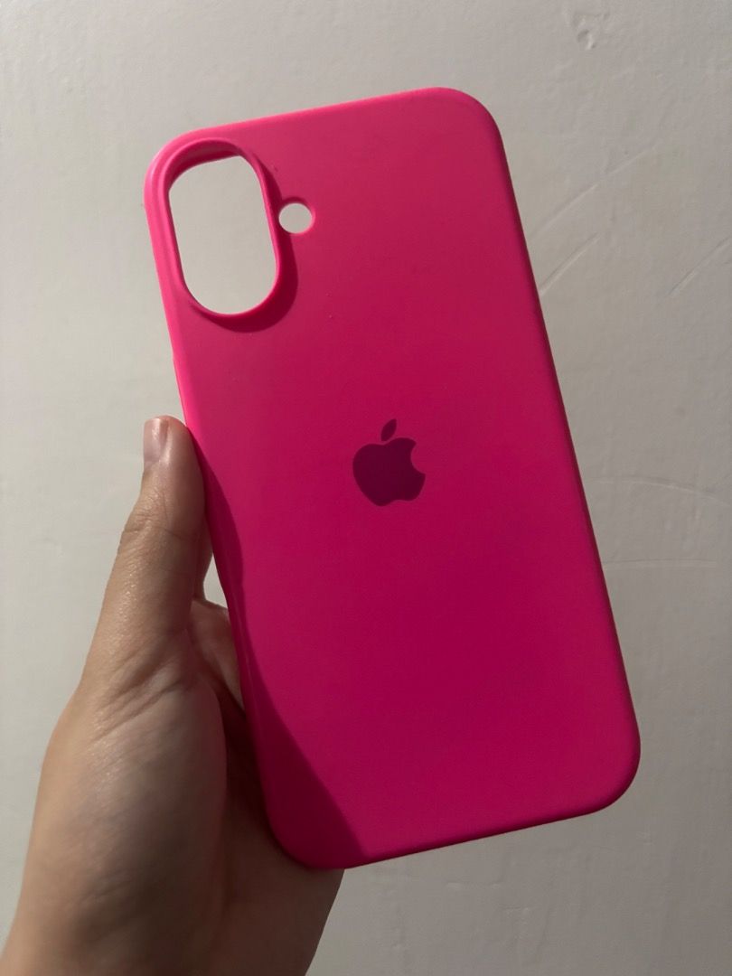 Case for iPhone 16 Plus (Category: Cases & Sleeves) located in Taguig. Submitted by vashtardo (Listing ID 1469210999, Image 2). Description: - Compatible Model: iPhone 16 Plus - Material: Premium smooth silicone with soft microfiber interior lining - Features: Vibrant color options (pink, purple, clear), MagSafe ring design, and matching wrist strap for secure carrying - Condition: Used and in good condition - Protection: Full coverage protection