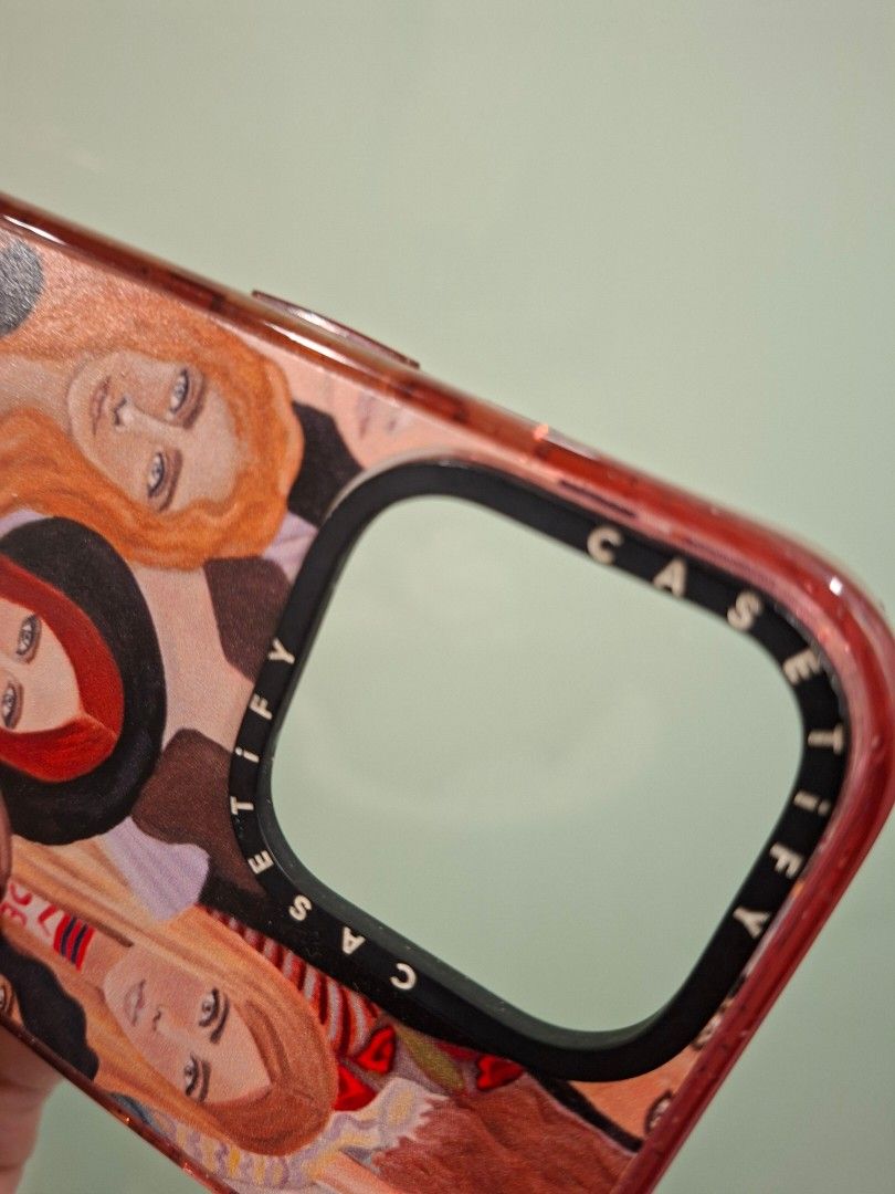 Casetify for Iphone 16 Pro Max (Category: Cases & Sleeves) located in Mandaluyong City. Submitted by k__z__ (Listing ID 1469163083, Image 3). Description: - Brand: Casetify - Compatibility: iPhone 16 Pro Max - Design: Artistic women faces print (one of Heart E's designs) with signature Casetify camera ring branding - Features: MagSafe compatible inner ring - Condition: Excellent, pre-loved - via shipping only -Used only a few times since 2 months