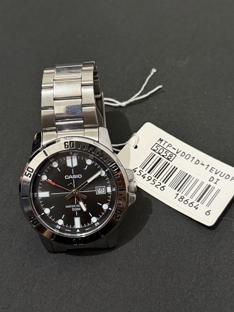 Casio MTP-VD01D Analog Watch (Category: Men's Watches) located in Quezon City. Submitted by kristlefernandez (Listing ID 1469245429, Image 2). Description: - With Factory tag - Classic black dial with a stylish rotating bezel and date display at 3 o'clock - Durable stainless steel bracelet (extra links included for sizing) - Water-resistant up to 50 meters - Complete with original blue box and hang tag - 100% authentic Casio watch - Only use 1 ti