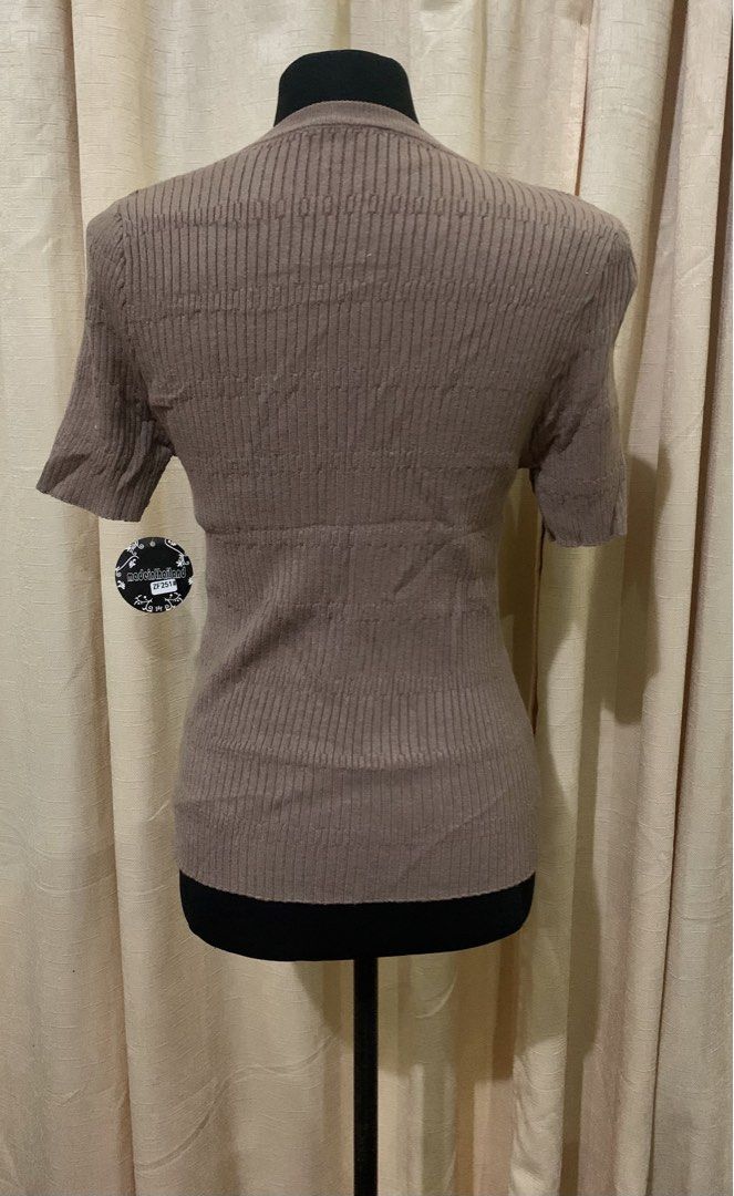 Casual Knitted Blouse (Category: Blouses) located in Cainta. Submitted by vestito_bestida (Listing ID 1469204411, Image 3). Description: ⛔️ACTUAL PHOTO POSTED⛔️ 👉 Brandnew Casual Knitted Blouse 👉 Free size 👉 Brand new with tags attached 👉 Short sleeve, crew neckline, stylish ribbed vertical texture 👉 Material: Stretchable, highly comfortable knit fabric 👉 Flatlay measured using medida 👉 Actual photo posted. 👉 No filter. Colors may vary du
