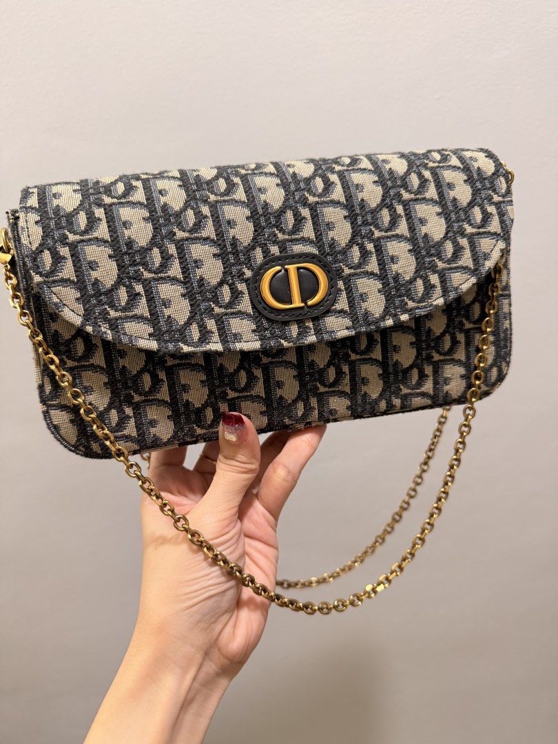 CD wallet on chain (Category: Luxury Bags & Wallets) located in Manila. Submitted by minimaison (Listing ID 1469209227, Image 2). Description: .