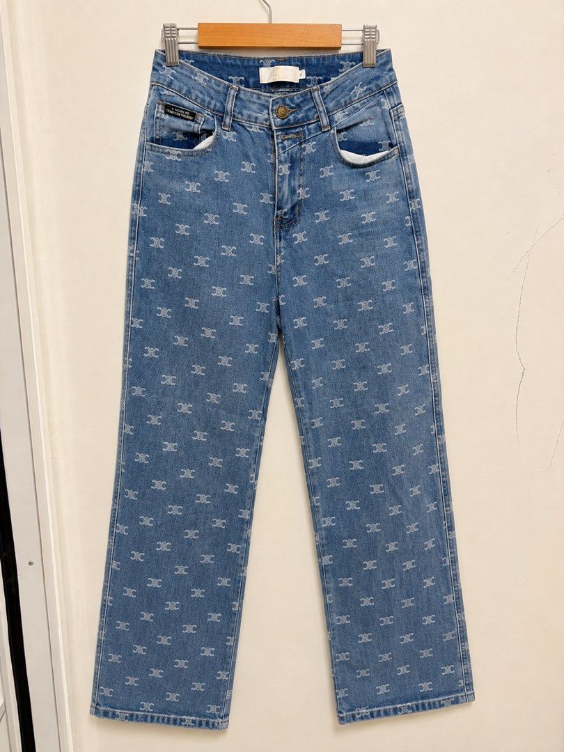 Celine Monogram Print Blue Denim Jeans (Category: Jeans) located in Subic. Submitted by ysbllrs (Listing ID 1469310799, Image 1). Description: - Brand: Celine - Style: Straight leg denim pants with all-over white monogram print - Color: Medium light blue wash - Closure: Standard button and zip fly - Pockets: Functional front and back pockets included - Condition: Excellent, clean wash - Size: Check size tag near the waistband for exact fit.