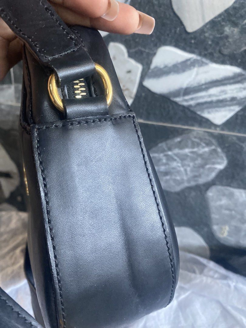 Celine Vintage Black Leather Shoulder Bag (Category: Luxury Bags & Wallets) located in Bacolod City. Submitted by chuchaystuffs (Listing ID 1469165267, Image 3). Description: - Authentic vintage Celine shoulder bag in black smooth leather - Elegant gold-tone hardware with embossed Celine Paris logo - Convenient adjustable strap for versatile wear - Secure top zipper closure with Celine engraved pull tab and front clasp - Clean side gussets and st