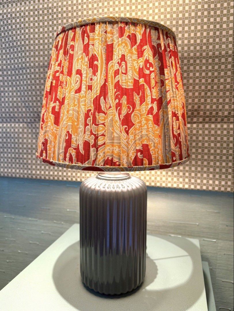Ceramic Table Lamp with Two Lampshade Options (Category: Lighting) located in Manila. Submitted by moscloset (Listing ID 1469248097, Image 2). Description: Authentic Solano Table Lamp - Has 2 lampshades to fit your mood and aesthetic - one in cream and another in a beautiful pleated paisley fabric - Barely used, excellent condition (9.5/10) - 2 pieces available! Can sell at a bundle discount if buying as a pair - RFS: Redecorating - Measurements: