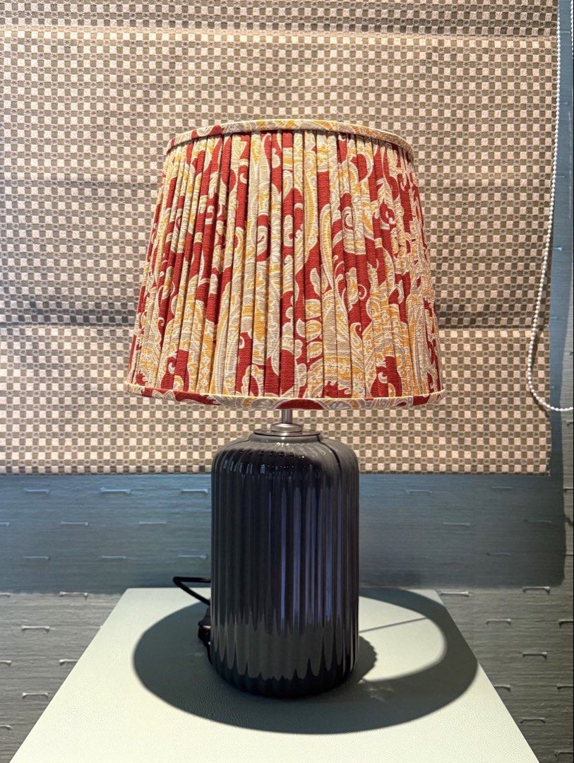 Ceramic Table Lamp with Two Lampshade Options (Category: Lighting) located in Manila. Submitted by moscloset (Listing ID 1469248097, Image 1). Description: Authentic Solano Table Lamp - Has 2 lampshades to fit your mood and aesthetic - one in cream and another in a beautiful pleated paisley fabric - Barely used, excellent condition (9.5/10) - 2 pieces available! Can sell at a bundle discount if buying as a pair - RFS: Redecorating - Measurements: