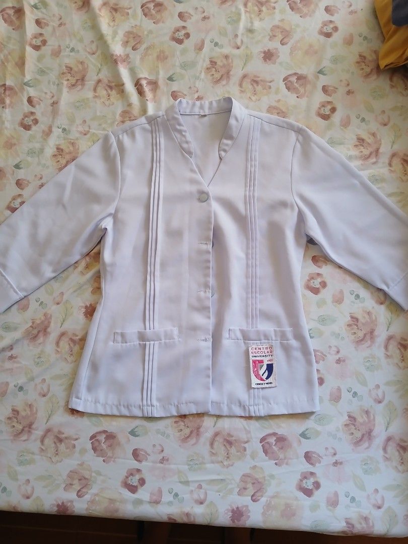 CEU Manila Gala Uniform (Category: Sets or Coordinates) located in Bacoor. Submitted by rm_sells (Listing ID 1469180775, Image 2). Description: - Official Centro Escolar University (CEU) uniform set -Purchased and used from year 2023 -Good condition -No stains and run - Includes long-sleeve white jacket with embroidered CEU pocket - Comes with matching standard white skirt - Clean, crisp fabric with front button closure - Perfect condition, ready