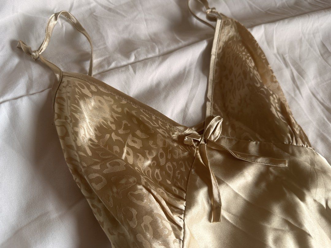 Champagne slip dress (Category: Dresses) located in Los Banos. Submitted by prel0v3d. (Listing ID 1469180788, Image 3). Description: Issue shown in picture .