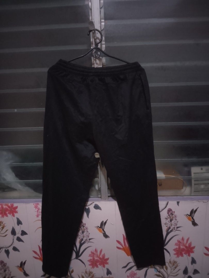 Champion Black Jogging Pants (Category: Joggers) located in Cavite. Submitted by genstylesph (Listing ID 1469384125, Image 2). Description: Champion Jogging Pants Color: Black Color rate 9/10 No issue Payment first thru Gcash Location Imus Cavite.