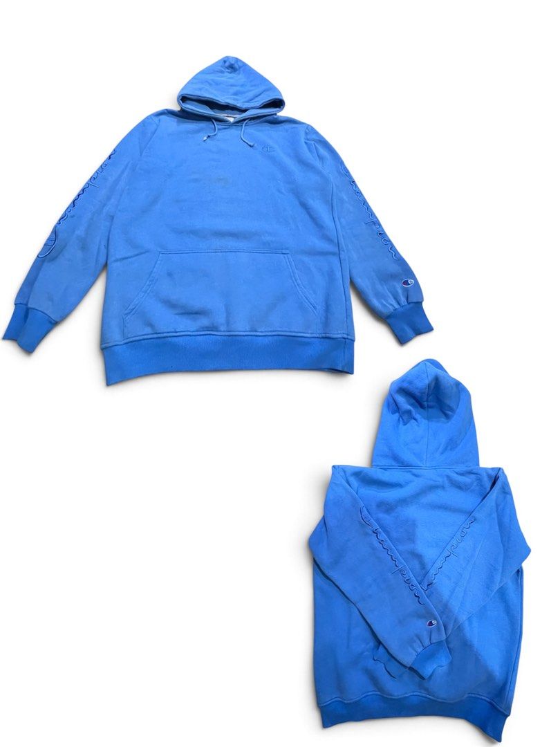 Champion Blue Hoodie with Sleeve Script Logo (Category: Coats, Jackets and Outerwear) located in Binan City. Submitted by huntwear_.turtle (Listing ID 1469167721, Image 1). Description: - Vibrant bright blue color with matching drawstrings - Iconic embroidered Champion script logo down both sleeves - Classic small C logo patch near the left cuff - Convenient front kangaroo pocket - Ribbed cuffs and hem to maintain shape - Relaxed fit for easy eve
