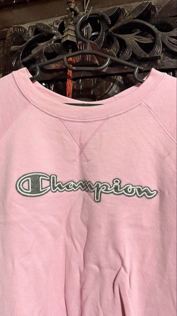 Champion Pink Script Logo Crewneck Sweatshirt Size XL (Category: Coats, Jackets and Outerwear) located in Las Pinas. Submitted by aliah2703 (Listing ID 1469173637, Image 3). Description: - Brand: Champion - Color: Pink with embroidered cursive logo - Size: XL USA (Relaxed fit) - Material: Comfortable athletic fleece, Made in Honduras - Details: Ribbed cuffs, hem, collar, and classic V-stitch neckline - Condition: Excellent pre-owned condition.