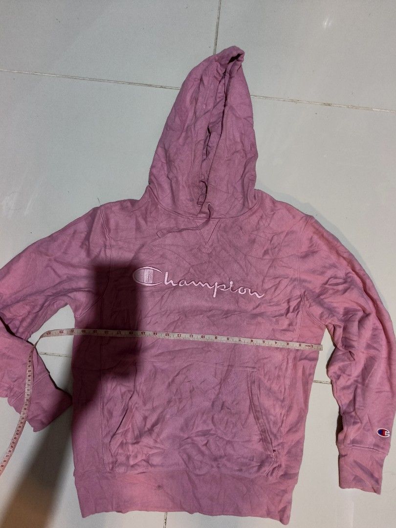 Champion Pink Script Logo Hoodie Size S (Category: Coats, Jackets and Outerwear) located in Davao. Submitted by romelyap (Listing ID 1469180463, Image 2). Description: - Brand: Champion - Color: Pink with embroidered script logo - Size: S (tag on collar) - Material: 88% cotton, 12% polyester body with spandex ribbing for stretch - Features: Front pouch pocket and adjustable drawstring hood - Origin: Made in Indonesia.