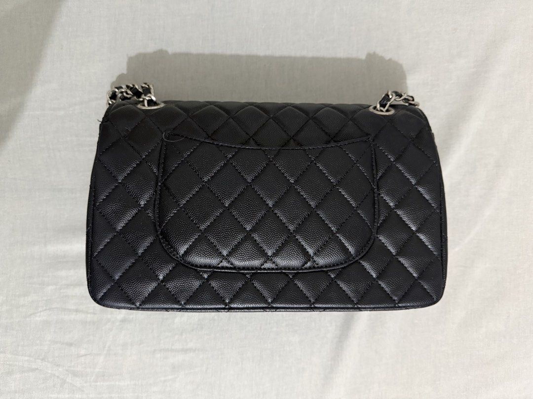 Chanel Black Caviar Leather Classic Medium Double Flap Bag (Category: Luxury Bags & Wallets) located in Quezon City. Submitted by vvandko (Listing ID 1469321920, Image 2). Description: Interior flaws only. Exterior is still in great condition! Microchip version NGA.