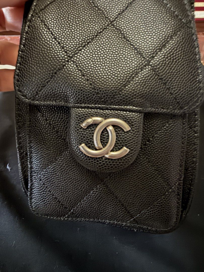 Chanel Black Caviar Leather Drawstring Handbag (Category: Luxury Bags & Wallets) located in Taguig. Submitted by kyliuh_ (Listing ID 1469180942, Image 2). Description: -Stunning ruthenium hardware and iconic interlocking CC logo front pocket - Secure drawstring main opening with interwoven chain and leather shoulder straps - Pristine black interior lining - Includes original dust bag -well-maintained condition -Unused and stored properly.