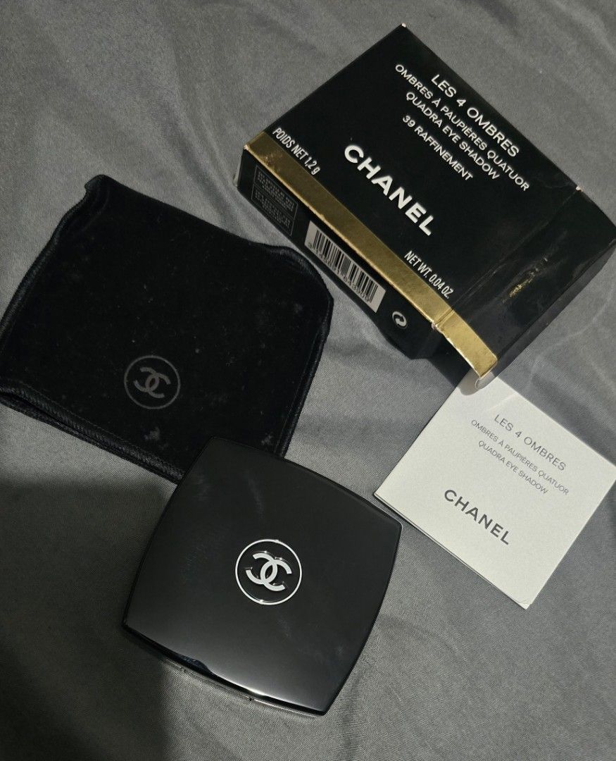 Chanel Les 4 Ombres Quadra Eye Shadow 39 Raffinement (Category: Makeup) located in Quezon. Submitted by archivesss_666 (Listing ID 1469313865, Image 1). Description: - Brand: Chanel - Product: Les 4 Ombres Multi-Effect Quadra Eyeshadow - Shade: 39 Raffinement (versatile neutral browns and taupes) - Net Weight: 1.2 grams - Complete set: Includes compact case with mirror, dual-ended applicator brush, velvet protective pouch, product pamphlet, and o