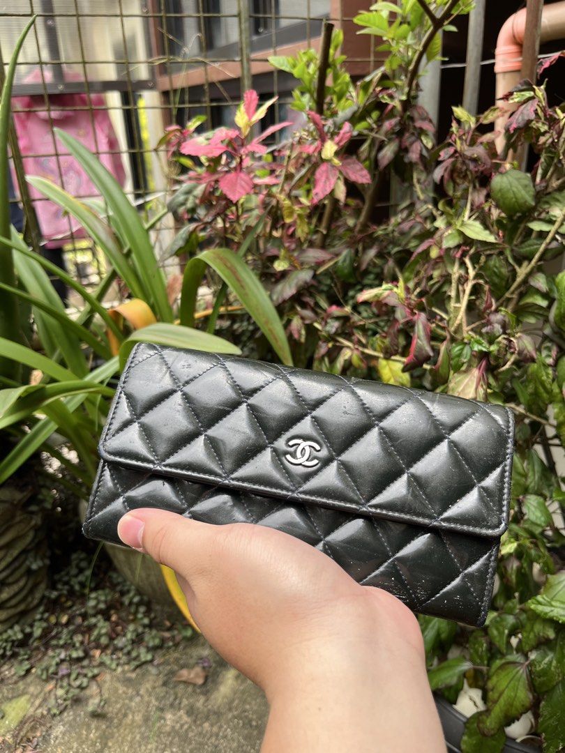 CHANEL LONG WALLET PATENT LEATHER (Category: Luxury Bags & Wallets) located in Baguio. Submitted by closetgc.clothingshop (Listing ID 1469211421, Image 1). Description: Chanel Pattent leather long wallet Quilted Rank AB ( needs spa ) Series 19, Guaranteed Authentic. Hologram intact. .
