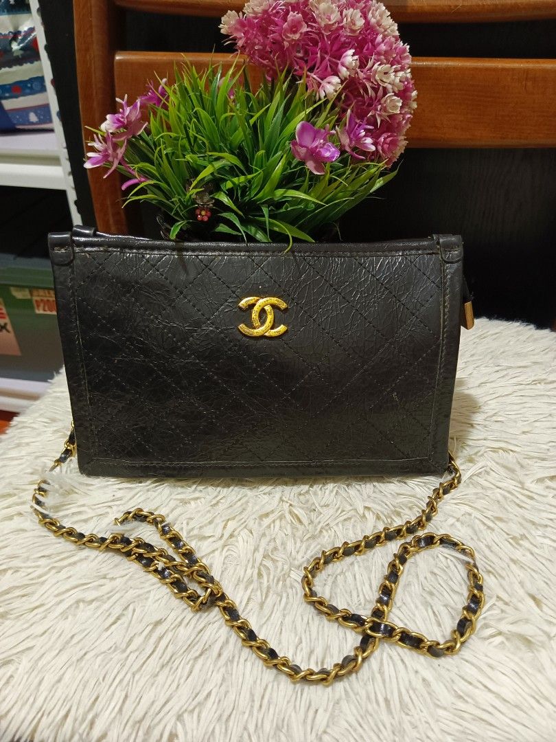 Chanel Quilted Black Leather Shoulder Bag (Category: Luxury Bags & Wallets) located in Digos. Submitted by chihanu (Listing ID 1469205941, Image 1). Description: - Chanel shoulder bag in classic black quilted leather - Elegant gold-tone hardware featuring the iconic interlocking CC logo - Versatile leather-intertwined chain strap that is completely detachable via clasps - Secure top zipper closure with a sleek metal pull - Compact yet spacious en
