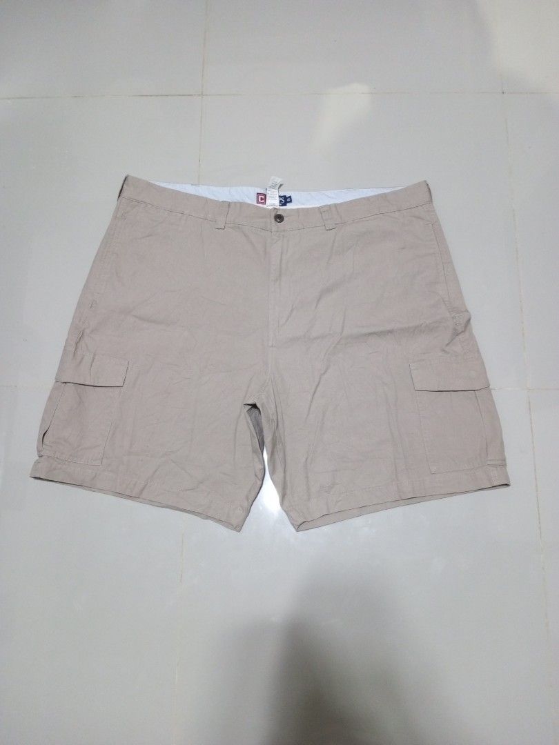 Chaps Cargo Shorts Size 46 (Category: Shorts) located in Magdalena. Submitted by magdalenathrift20 (Listing ID 1469168849, Image 2). Description: - Brand: Chaps - Color: Beige - Size: 46 (fits waistline 46" to 48") - Length: 23 inches - Closure: Button closure with belt loops - Pockets: Multiple functional pockets on sides and back - Fit: Standard casual fit, perfect for warm weather.