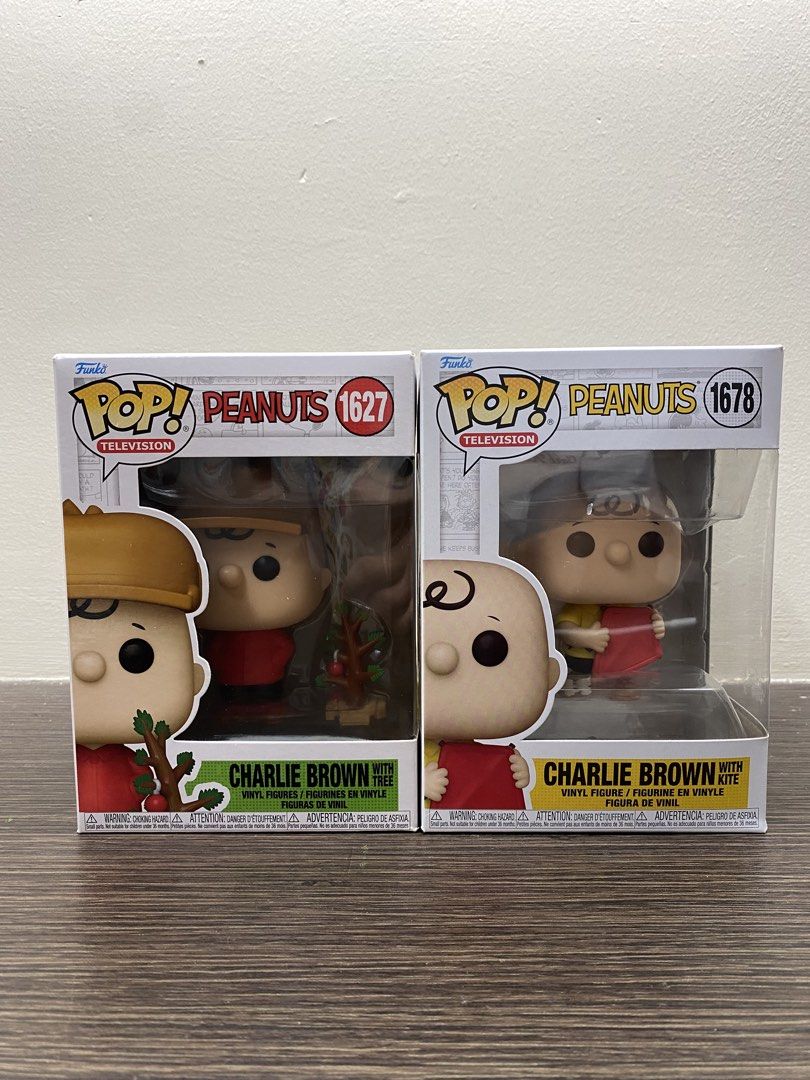 Charlie Brown Funko Pop! Bundle (Category: Figurines & Statues) located in Naga. Submitted by scrvlm (Listing ID 1469243158, Image 2). Description: Funko Pop! Peanuts - Charlie Brown with Tree #1627 Funko Pop! Peanuts - Charlie Brown with Kite #1678.