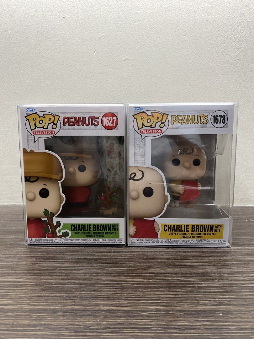 Charlie Brown Funko Pop! Bundle (Category: Figurines & Statues) located in Naga. Submitted by scrvlm (Listing ID 1469243158, Image 1). Description: Funko Pop! Peanuts - Charlie Brown with Tree #1627 Funko Pop! Peanuts - Charlie Brown with Kite #1678.