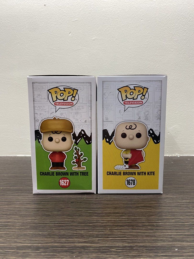 Charlie Brown Funko Pop! Bundle (Category: Figurines & Statues) located in Naga. Submitted by scrvlm (Listing ID 1469243158, Image 3). Description: Funko Pop! Peanuts - Charlie Brown with Tree #1627 Funko Pop! Peanuts - Charlie Brown with Kite #1678.