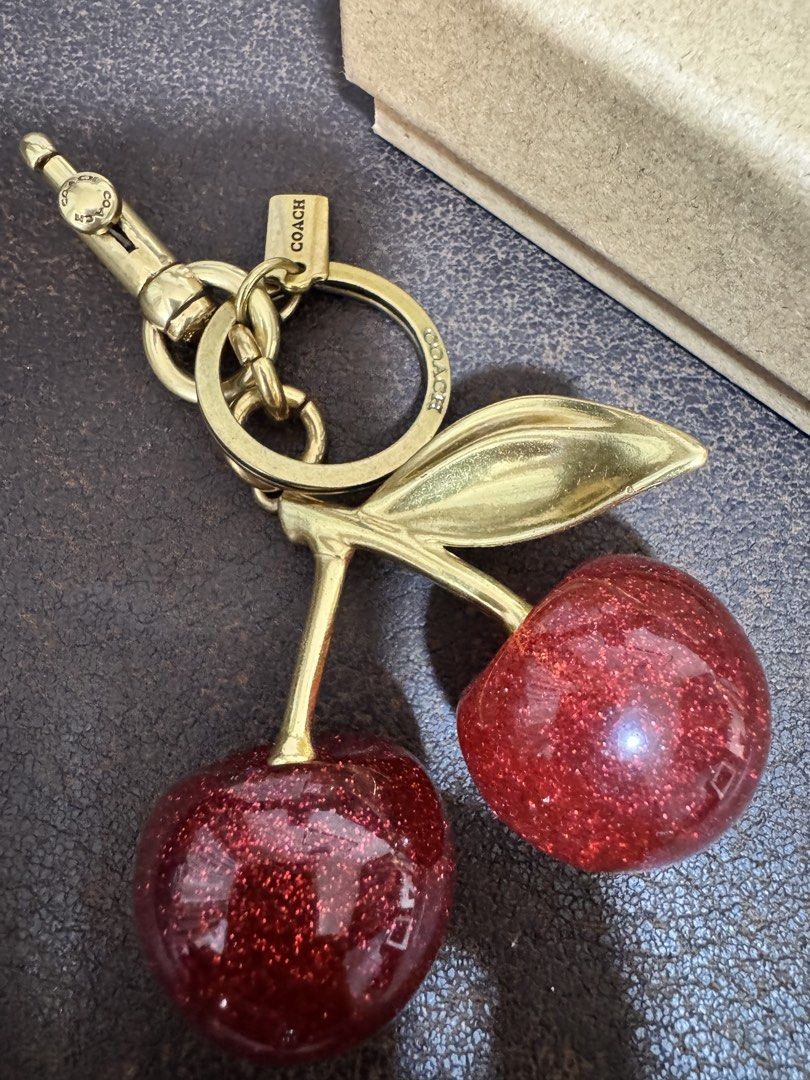 Coach Cherry Charm (Category: Purses & Pouches) located in Manila. Submitted by clutterfreeera (Listing ID 1469162491, Image 1). Description: Actual pics posted With box .