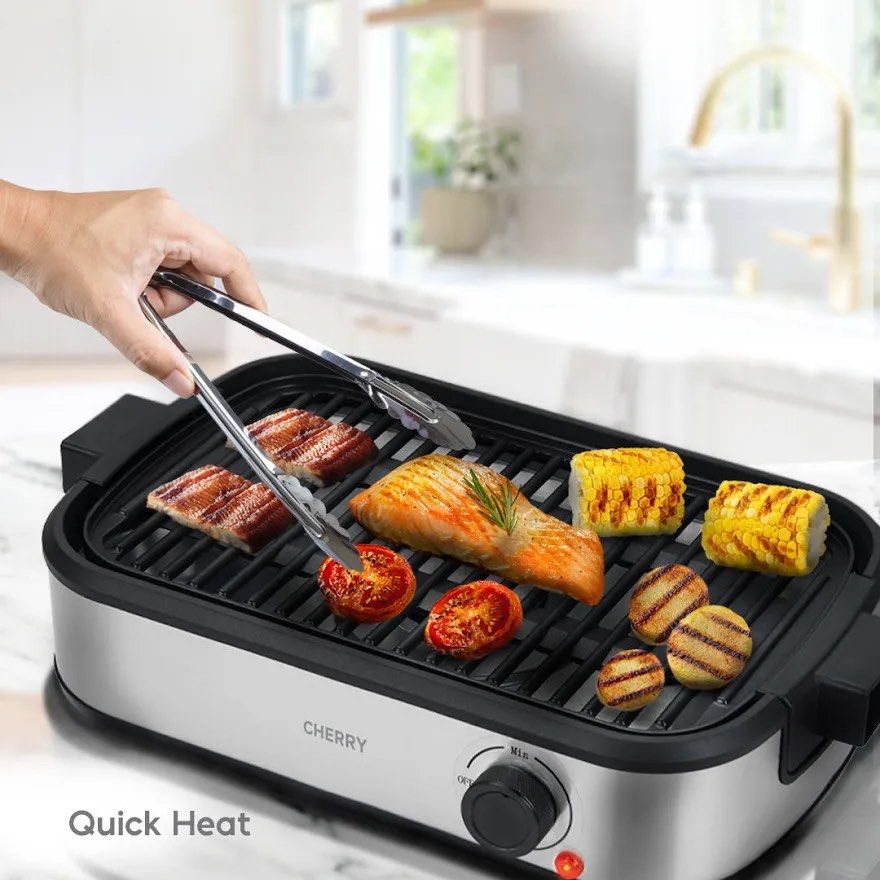 Cherry Easy Smokeless BBQ Grill GR100 Silver (Category: BBQ, Grills & Hotpots) located in Quezon City. Submitted by bravehorse_f1f6d5 (Listing ID 1469279804, Image 1). Description: - Brand: Cherry Easy - Model: GR100 Smokeless BBQ Grill - Color: Silver - Weight: 2.45kg - Power: 220-240V, 60Hz - Materials: PET, stainless steel, and die-cast aluminum plate - Dimensions: 440 x 260 x 100mm - Condition: Brand new, factory-sealed, unopened box - Inclus