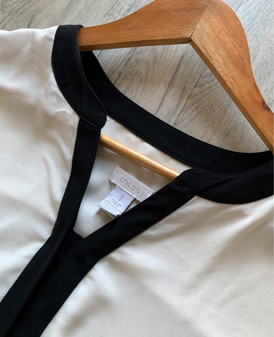 CHICO’S Ivory White Loose Top (Category: Others Tops) located in Paranaque City. Submitted by famsale2016 (Listing ID 1469246461, Image 2). Description: Like new ✨ Size 1/Medium on tag can fit Large Size S & M available Chico’s is an American women’s clothing and accessories retailer founded in 1983 on Sanibel Island, Florida, by Helene and Marvin Gralnick..