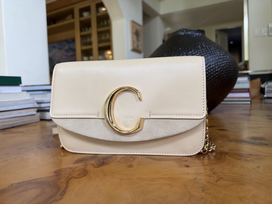 Chloé C Leather and Suede Shoulder Bag (Category: Luxury Bags & Wallets) located in Muntinlupa City. Submitted by katoshops (Listing ID 1469202008, Image 2). Description: Chloe C Chain Clutch Current Market Price: 1,190.00 USD Selling Price: ₱9,900.00 Condition: Very Good (8.5/10) Reason for Selling: Don’t get to use this bag. Additional Details: Color: Beige calfskin with gold hardware Worn: A few times Flaws: Gold-tone hardware has minor discol