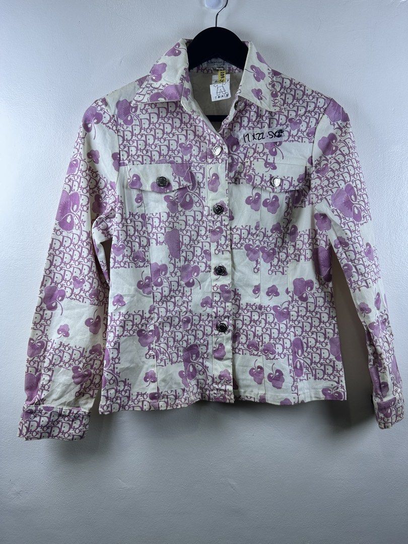Christian Dior Monogram Floral Print Denim Jacket (Category: Coats, Jackets and Outerwear) located in Manila. Submitted by declutterpromax (Listing ID 1469214711, Image 1). Description: - Brand: Christian Dior - Design: Purple and white monogram pattern mixed with floral motifs - Features: Button-front closure, two chest pockets with button flaps, structured collar, silver-tone branded buttons - Condition: Pre-owned with visible yellowish stainin