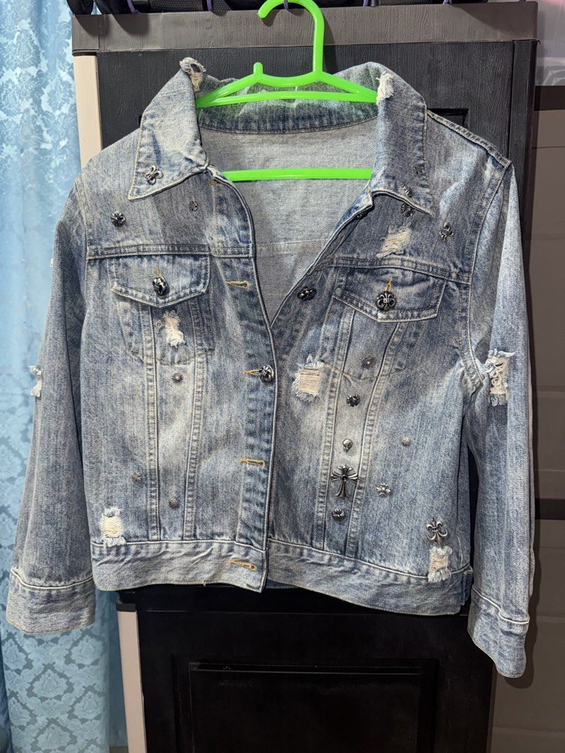 Chrome Hearts Denim Jacket (Category: Coats, Jackets and Outerwear) located in Roxas City. Submitted by yanskiezco (Listing ID 1469180798, Image 2). Description: Item: Chrome Hearts Distressed Silver-Studded Denim Trucker Jacket Brand: Chrome Hearts (RN# 95024) Material: 100% Cotton Size: Large (L) Origin: Made in U.S.A. Features: Light-wash, acid-distressed denim fabric featuring intentional distressing and frayed teardown tears. Signature Chrom