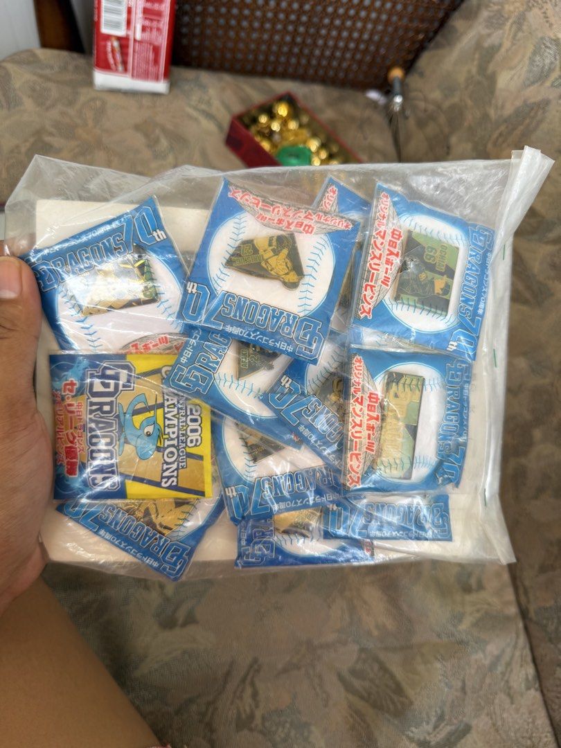 Chunichi Dragons 2006 70th Anniversary Pin Set (Category: Character Goods) located in Digos. Submitted by old_soul. (Listing ID 1469198713, Image 2). Description: - Official Chunichi Dragons 70th Anniversary Collector Pin Set (2006) - Commemorates the team's historic Central League championship - Includes multiple baseball player pins in the original box - Brand new and still sealed in its original plastic wrapper - Perfect addition for NPB fans 