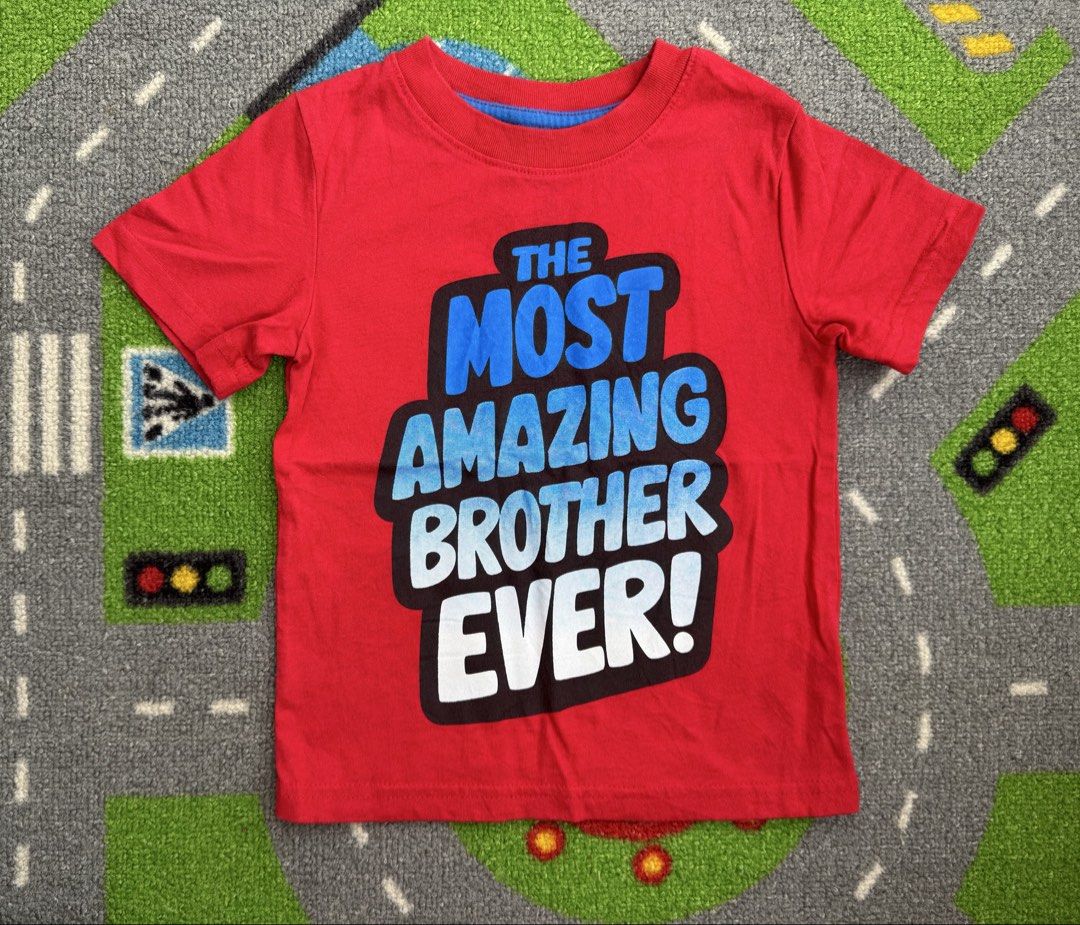 Circo T-Shirt (Category: Babies & Kids Fashion) located in Rizal. Submitted by preloovved (Listing ID 1469273253, Image 1). Description: Red Circo boys' t-shirt with 'The Most Amazing Brother Ever' graphic. Soft, breathable cotton material for all-day comfort. Size 2 years. Preloved, 2yo Meet-up only in GB1 San Mateo, Rizal Shipping fee c/o buyer. Tres Marias or J&T express Payment to be sent to me via BPI/BDO/GCASH only. 😁 C#.