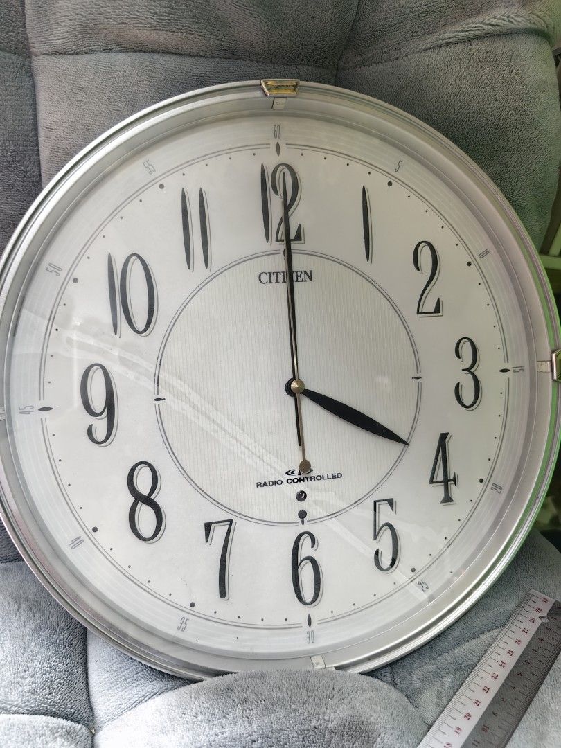 Citizen Radio Controlled Wall Clock (Category: Clocks) located in Rizal. Submitted by gkstcenit (Listing ID 1469171026, Image 1). Description: Take all 3pcs for 1000 Brand: Citizen Radio-Controlled Wall Clock - Design: Classic analog style with a clean face and large, easy-to-read numbers - Color/Finish: Round shape with a stylish green and silver trim - Size: Approximately 30 cm in diameter - Power: Battery-operated (battery compartment on the b