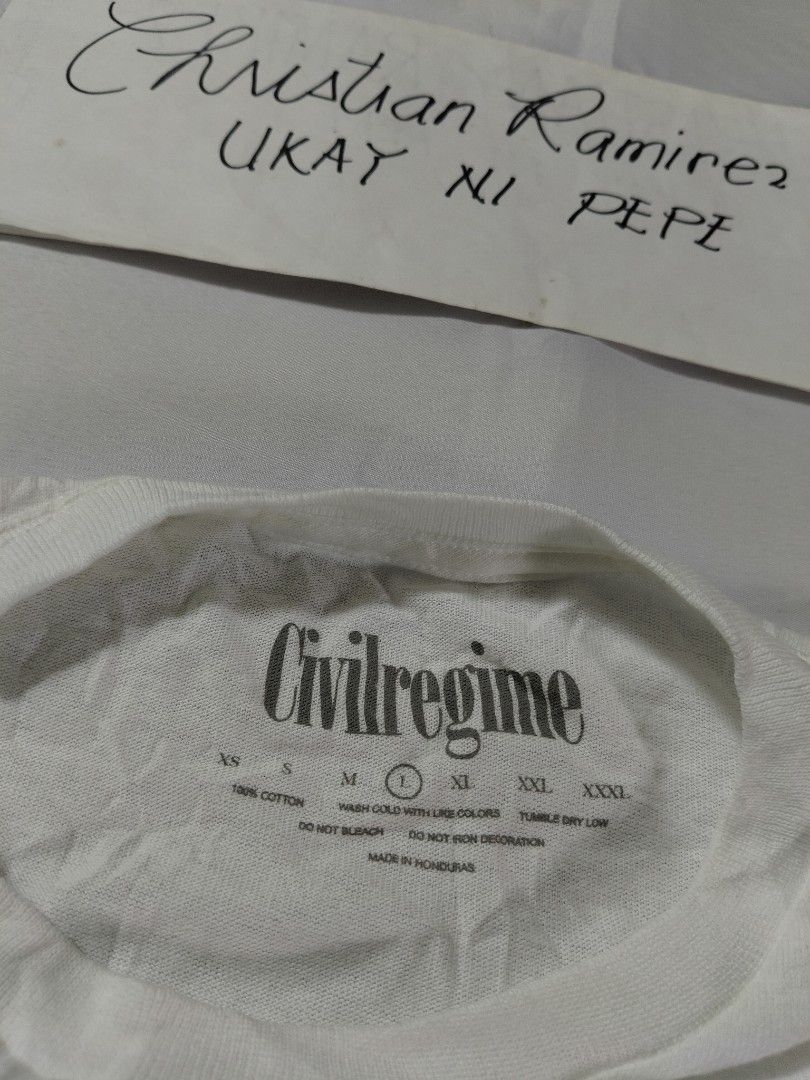 Civil Regime graphic tee (Category: Tshirts & Polo Shirts ) located in Bocaue. Submitted by ukaynipepe (Listing ID 1469324149, Image 3). Description: Civil Regime Large Width 20 Length 28 No flaws Excellent condition.
