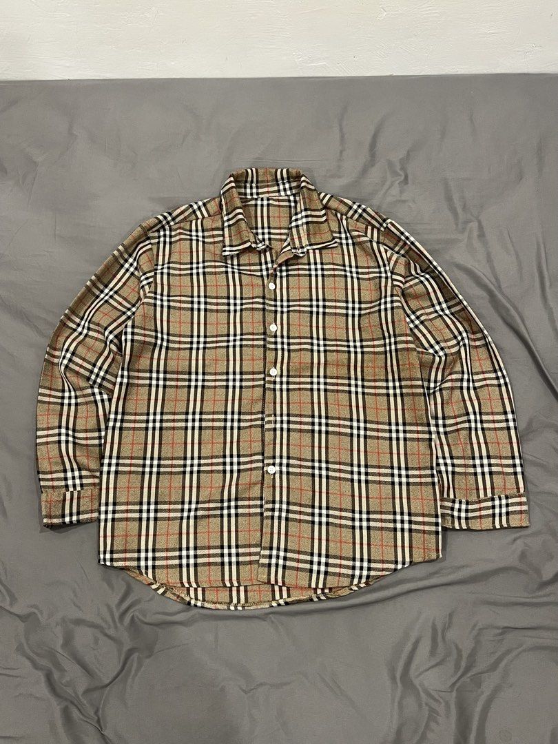 Classic plaid long-sleeve button-up shirt (Category: Coats, Jackets and Outerwear) located in Santa Rosa. Submitted by truecat.9d0628 (Listing ID 1469321652, Image 1). Description: - Vintage-style long-sleeve button-down shirt - Classic beige, black, and red plaid pattern - Soft and comfortable flannel-like fabric - Features a standard collar, front button closure, and button cuffs - Versatile rounded hemline (great tucked in or out) - Easy to pa