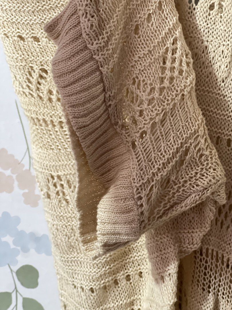 CLEF DE SOL Beige Open Knit Cardigan (Category: Coats, Jackets and Outerwear) located in Pasig City. Submitted by morilove (Listing ID 1469186304, Image 3). Description: - Brand: Clef De Sol - Color: Cream - Material: Lightweight knit with intricate open weave pattern - Closure: Wooden buttons at the front - Details: Long sleeves with ribbed cuffs - Style: Breezy layering piece ideal for sunny days and cool evenings - Condition: Excellent.