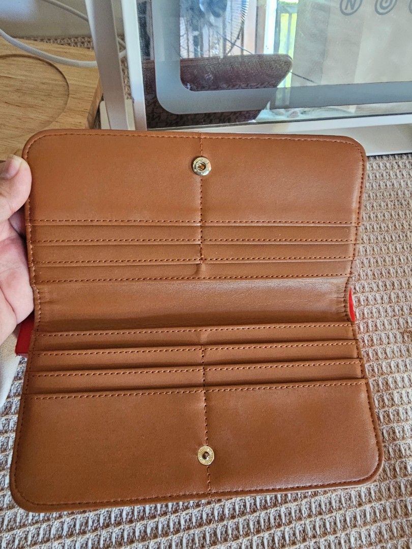 CLN Analey Long Wallet Coffee (Category: Wallets & Card holders) located in San Pablo. Submitted by anicahclosetonlineshop (Listing ID 1469293378, Image 2). Description: - Brand: CLN - Model: 0723W-Analey - Color: Coffee with brown trim (Monogram pattern) - Closure: Snap button - Interior: Multiple card slots and a zippered coin pocket - Condition: Brand new, never used, properly stored - Inclusions: Original red box and dust bag.