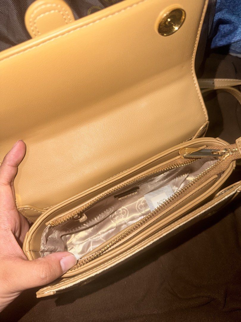 CLN Coralyn Handbag in Beige (Category: Luxury Bags & Wallets) located in Mandaluyong City. Submitted by krstlmkk_ (Listing ID 1469310447, Image 3). Description: - Brand: CLN - Design: Monogram print in beige with chic tan trim and elegant gold-tone hardware - Versatile: Comes with a top handle and a detachable/adjustable long strap - Closure & Storage: Secure front flap closure with a convenient inside zip pocket for essentials - Inclusion: Come