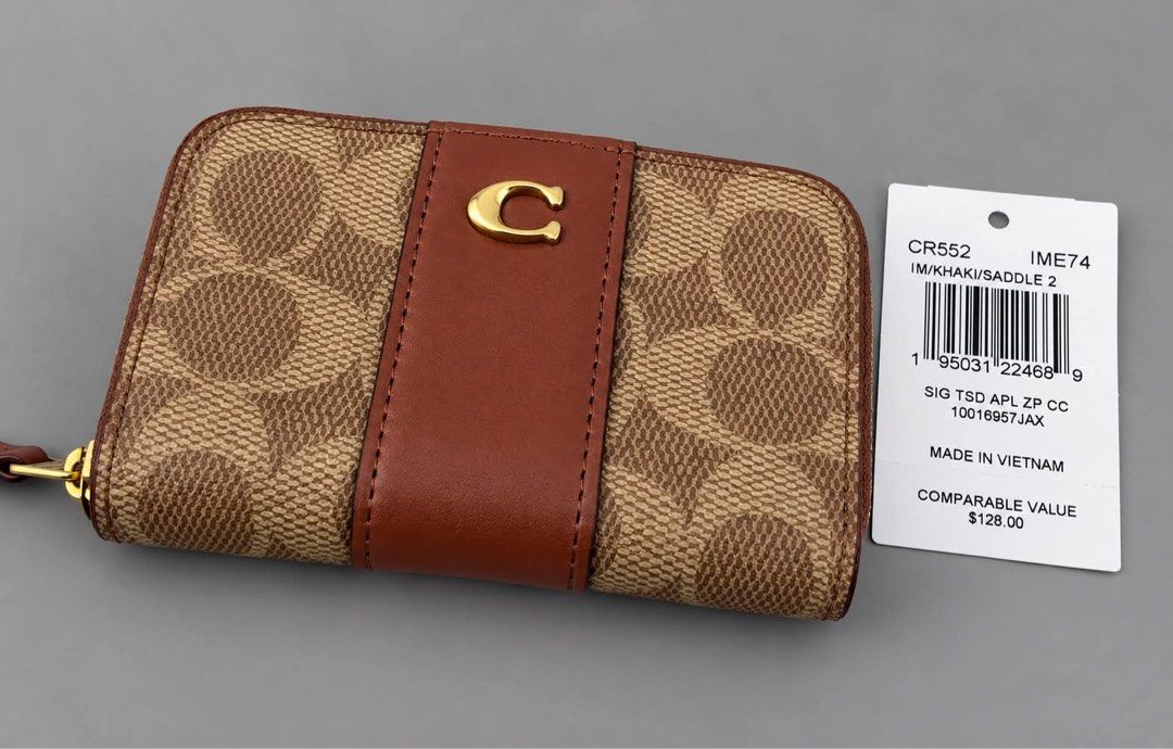 Coach Essential Small Zip Around Case in Signature Canvas (Category: Wallets & Card holders) located in Binan City. Submitted by pinkykeenshop (Listing ID 1469229258, Image 1). Description: .