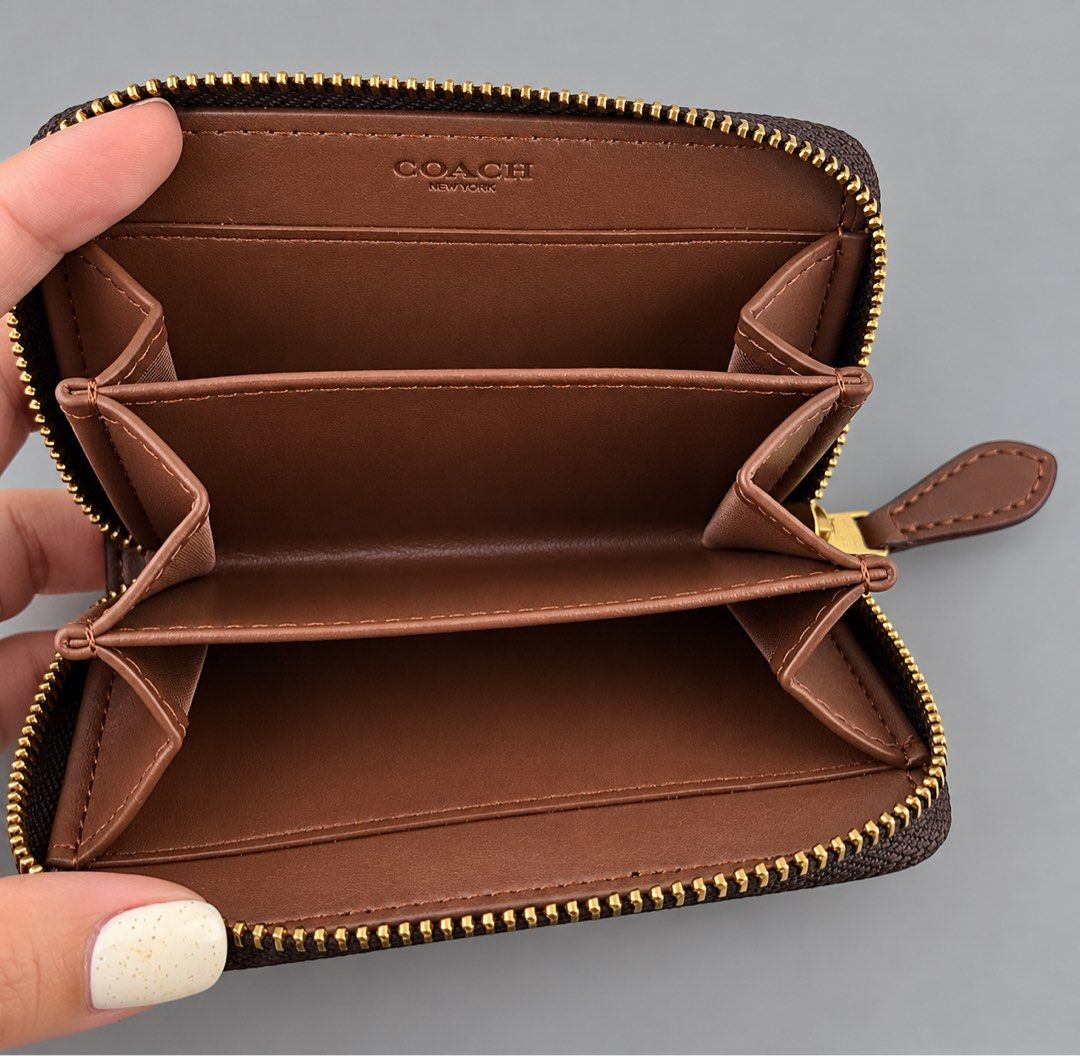 Coach Essential Small Zip Around Case in Signature Canvas (Category: Wallets & Card holders) located in Binan City. Submitted by pinkykeenshop (Listing ID 1469229398, Image 2). Description: .