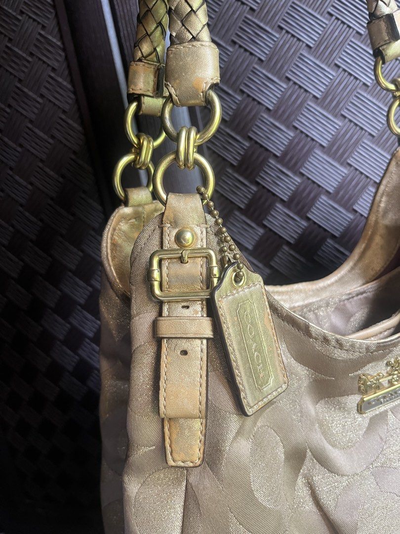 Coach Madison Hobo (Category: Luxury Bags & Wallets) located in Iloilo. Submitted by jaeelleanik2 (Listing ID 1469165946, Image 3). Description: Please see photos for details No rubs on canvas Faded leather Need retouch on leather and hangtag Intact creed Needs cleaning +++SF.