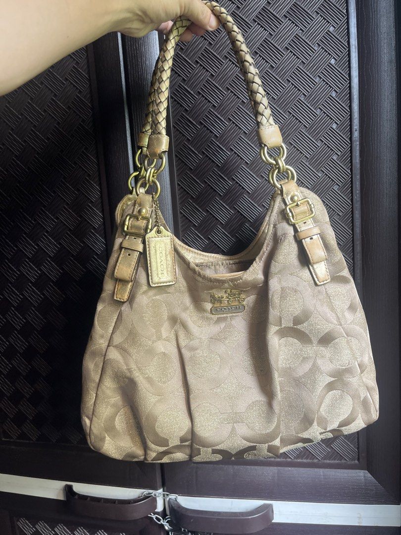 Coach Madison Hobo (Category: Luxury Bags & Wallets) located in Iloilo. Submitted by jaeelleanik2 (Listing ID 1469165946, Image 1). Description: Please see photos for details No rubs on canvas Faded leather Need retouch on leather and hangtag Intact creed Needs cleaning +++SF.