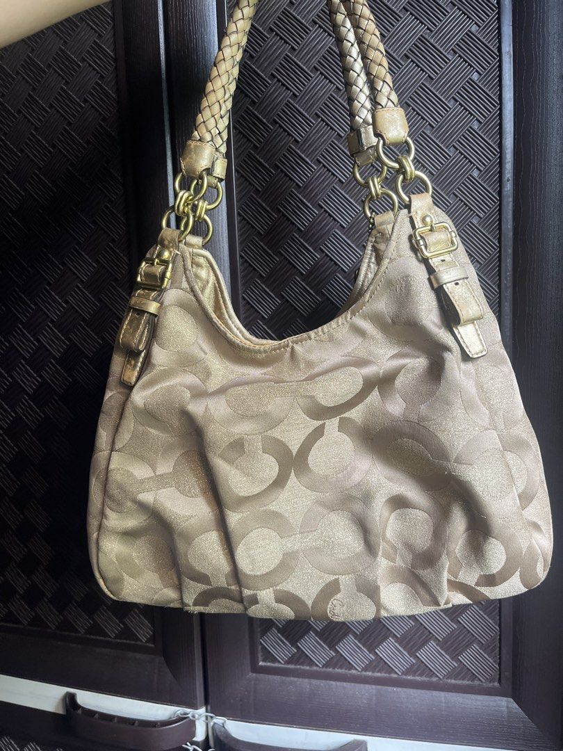 Coach Madison Hobo (Category: Luxury Bags & Wallets) located in Iloilo. Submitted by jaeelleanik2 (Listing ID 1469165946, Image 2). Description: Please see photos for details No rubs on canvas Faded leather Need retouch on leather and hangtag Intact creed Needs cleaning +++SF.