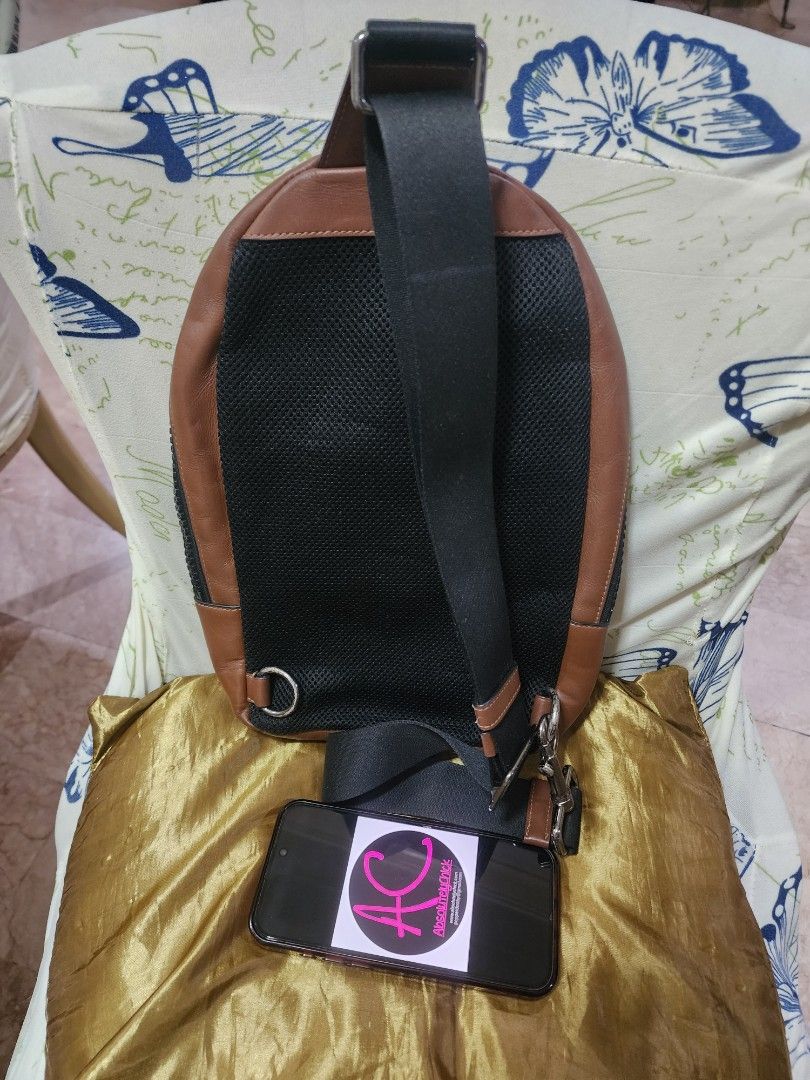 Coach Men's Charles Crossbody Backpack (Category: Backpacks) located in Valenzuela. Submitted by absolutelychick (Listing ID 1324743214, Image 2). Description: L 11" x W 3.25" x H 10.75" meron pong fade sa mga hardwares nylon and leather material Yung name sa front natanggal na po yung coating please check pictures for reference jrs, lbc, j&t lalamove/grab ready.
