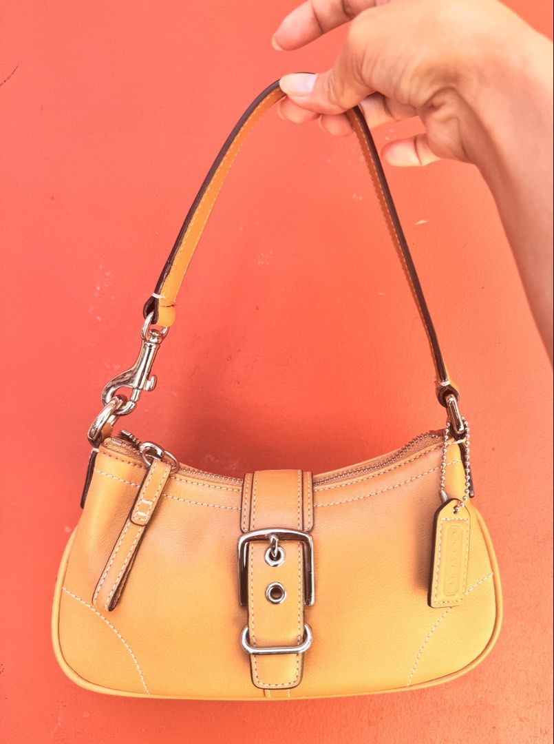 Coach Soho Leather Buckle Demi Bag (Category: Luxury Bags & Wallets) located in Dumaguete. Submitted by dayvi143 (Listing ID 1462325477, Image 1). Description: ❗️ EVERYTHING MUST GO ❗️ Authentic coach demi buckle bag (mini) Like new condition. Wala akong mapintas. Price is still negotiable.