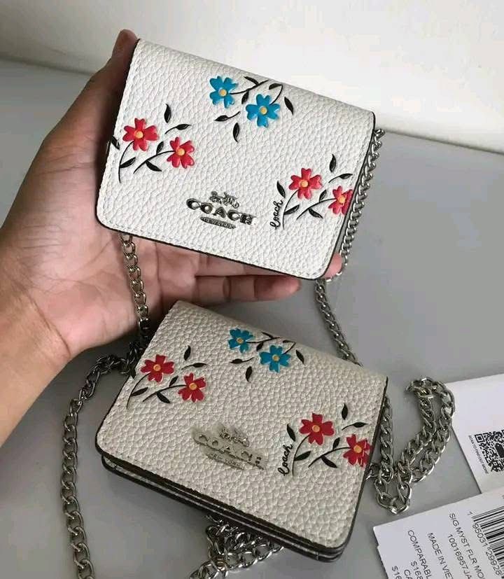 Coach Mini Chain Wallet (Category: Wallets & Card holders) located in Binan City. Submitted by pinkykeenshop (Listing ID 1469209963, Image 1). Description: .
