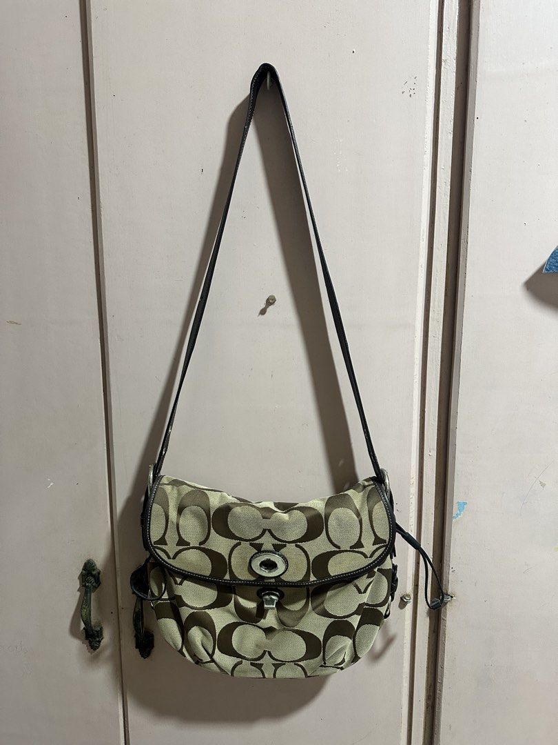 Coach sling bag (Category: Cross-body Bags) located in Lipa City. Submitted by jmariebbb (Listing ID 1469255479, Image 1). Description: Coach authentic sling bag. Sf: 200 Price Negotiable to sure buyers .