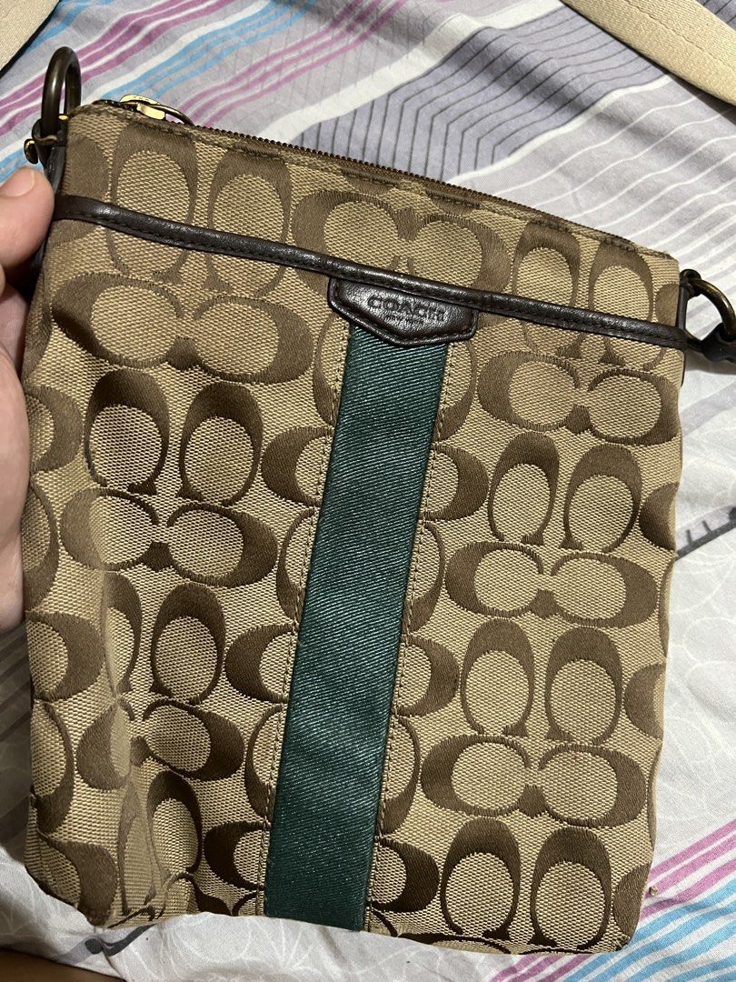 Coach sling bag brown (Category: Luxury Bags & Wallets) located in Navotas City. Submitted by maxspreloved (Listing ID 1469186293, Image 1). Description: Coach crossbody bag beige/brown Authentic from the US Condition: 7/10 (needs cleaning, but no leather cracks) RFS: decluttering.