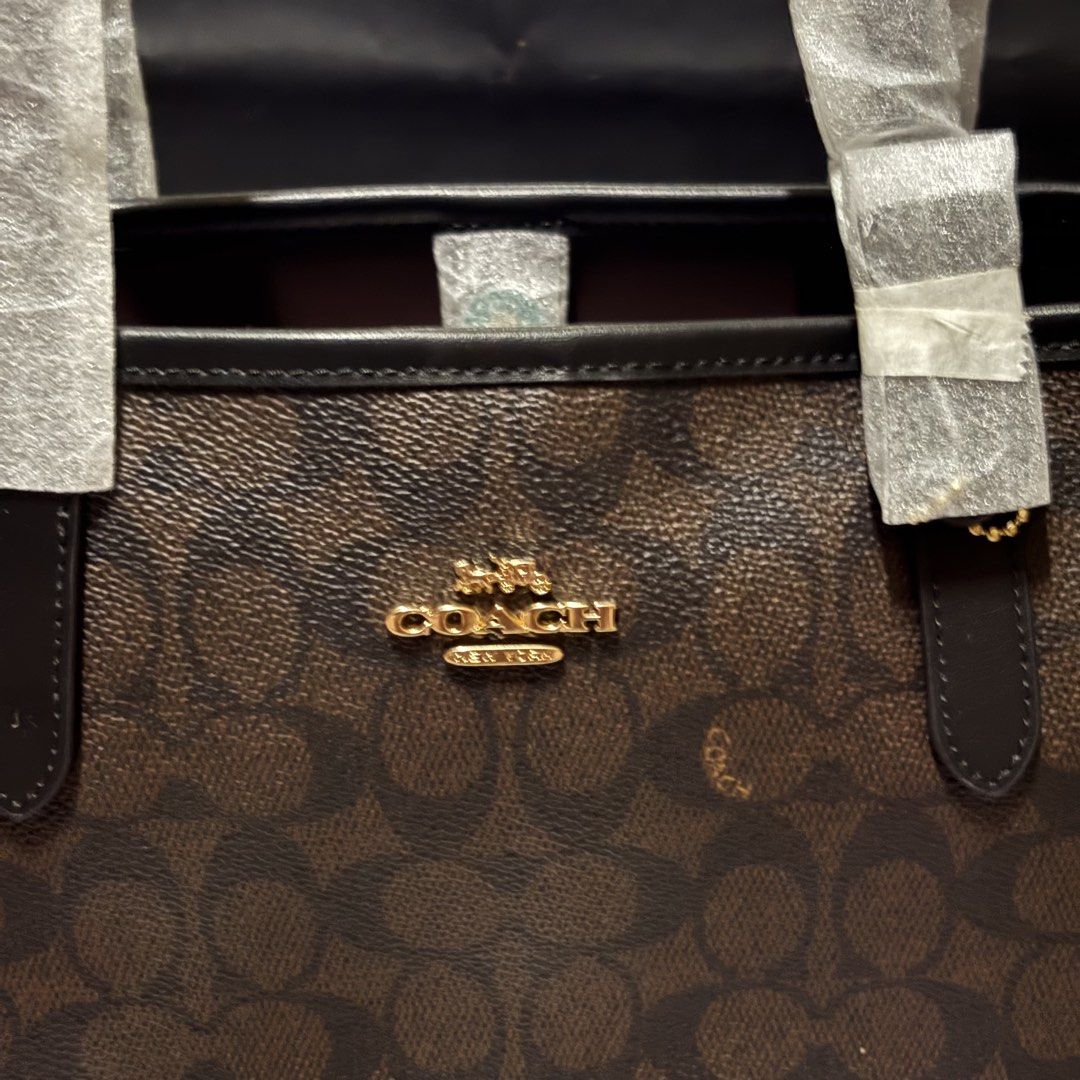 Coach Small City Tote in Walnut (Category: Luxury Bags & Wallets) located in Pasig City. Submitted by madiscarte.ph (Listing ID 1469240724, Image 2). Description: New w tag and cc.