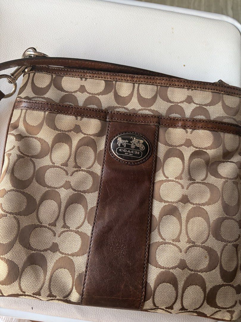Coach Sutton Crossbody Bag (Category: Cross-body Bags) located in Manila. Submitted by silksyrenph (Listing ID 1469245354, Image 2). Description: - with signs of usage on leather - no rubs on canvas - no hangtag - 8.5/10 condition.